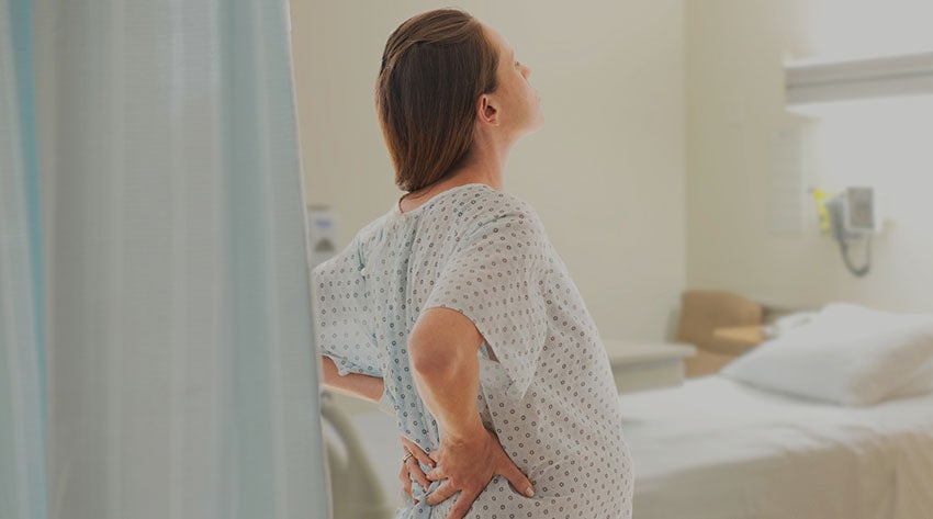 pregnant mother in the delivery room experiencing contractions