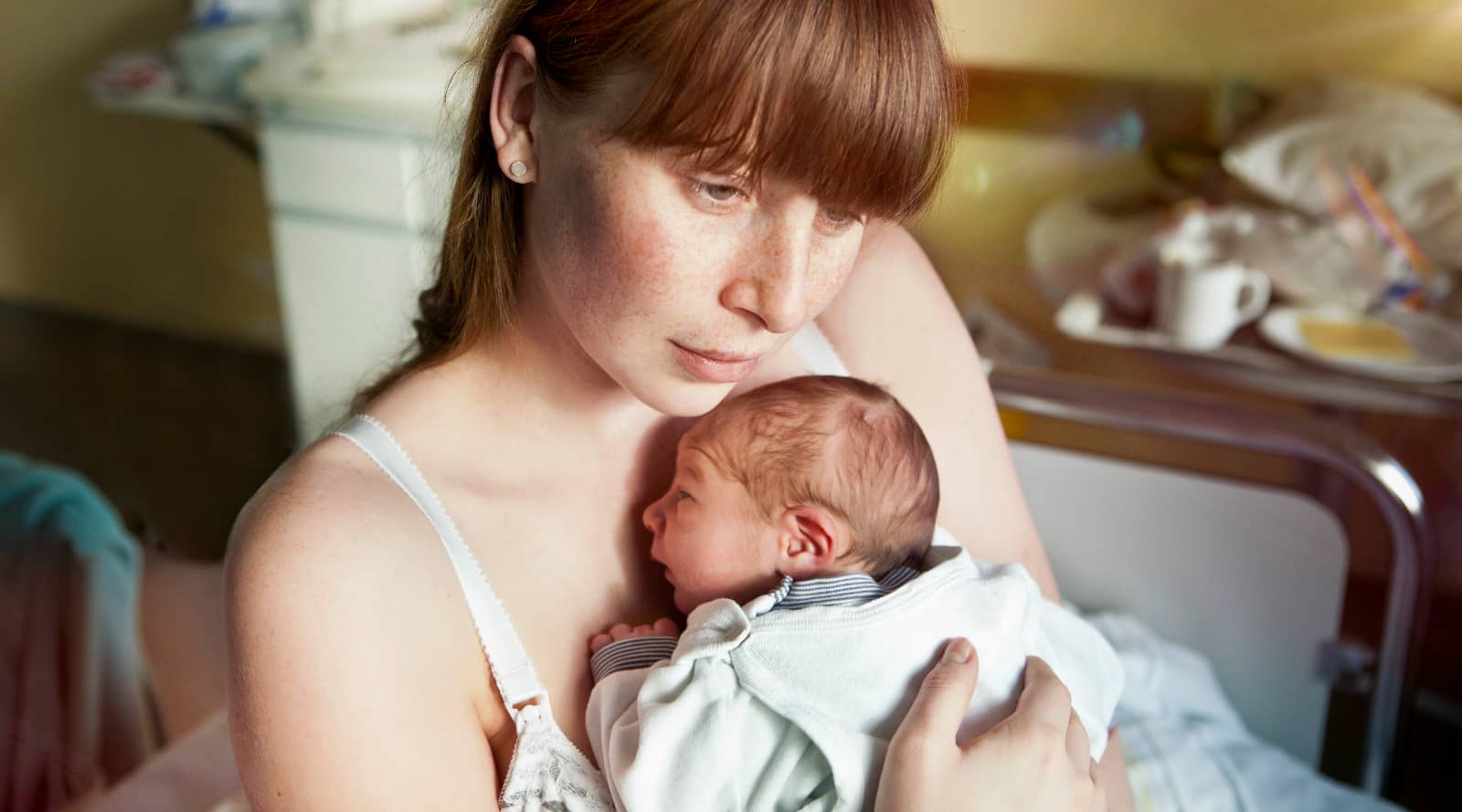 New mom holding newborn